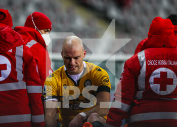 2020-12-12 - Bram Nuytinck of Udinese Calcio injured during the match during the Serie A 2020/21 football match between Torino FC vs Udinese Calcio at the Stadio Olimpico Grande Torino, Turin, Italy on December 12, 2020 - Photo FCI / Fabrizio Carabelli - TORINO VS UDINESE - ITALIAN SERIE A - SOCCER