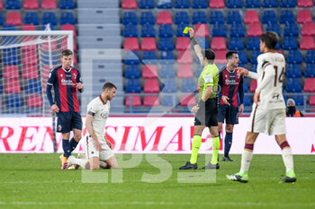 2020-12-13 - yellow card for Andri Baldursson (Bologna) after a foul on Edin Dzeko (AS Roma) -  BOLOGNA FC VS AS ROMA - ITALIAN SERIE A - SOCCER