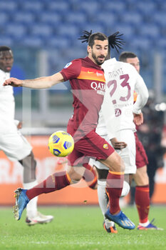 2020-12-17 -  ROME, ITALY - December 17 :  Henrikh Mkhitarian of AS Roma action during the Serie A soccer match between AS Roma and Torino FC at Stadio Olimpico on December 17,2020 in Rome Italy - ROMA VS TORINO - ITALIAN SERIE A - SOCCER