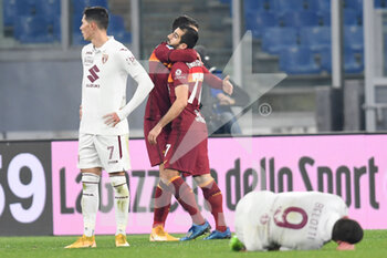 2020-12-17 - ROME, ITALY - December 17 : Henrikh Mkhitaryan of AS Roma celebrates after scores a goal during Italian Serie A soccer match between AS Roma and Torino FC at Stadio Olimpico on December 17,2020 in Rome Italy - ROMA VS TORINO - ITALIAN SERIE A - SOCCER