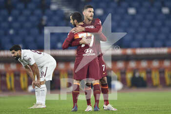 2020-12-17 -  ROME, ITALY - December 17 : Lorenzo Pellegrini (7 ) of AS Roma celebrates after scoring a goal during Italian Serie A soccer match between AS Roma and Torino FC at Stadio Olimpico on December 17,2020 in Rome Italy - ROMA VS TORINO - ITALIAN SERIE A - SOCCER