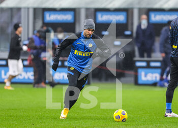 2020-12-20 - Christian Eriksen of FC Internazionale warms up during the Serie A 2020/21 football match between FC Internazionale vs Spezia Calcio at the San Siro Stadium, Milan, Italy on December 20, 2020 - Photo FCI / Fabrizio Carabelli - INTER VS SPEZIA - ITALIAN SERIE A - SOCCER