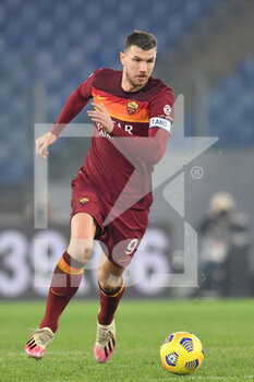 2020-12-23 -  ROME, ITALY - December 23 : Edin Dzeko  of AS Roma in action during the Serie A soccer match between AS Roma and Cagliari at Stadio Olimpico on December 23,2020 in Rome Italy  - ROMA VS CAGLIARI - ITALIAN SERIE A - SOCCER