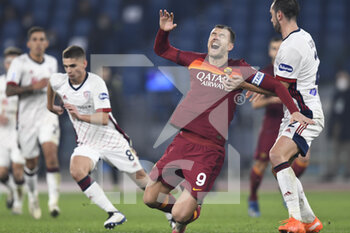 2020-12-23 -  ROME, ITALY - December 23 : Edin Dzeko (L) of AS Roma gesture during the Serie A soccer match between AS Roma and Cagliari at Stadio Olimpico on December 23,2020 in Rome Italy  - ROMA VS CAGLIARI - ITALIAN SERIE A - SOCCER