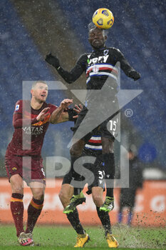 2021-01-03 - ROME, ITALY - January 3 : Omar Colley (R) of UC Sampdoria in action against Edin Dzeko(L) of AS Roma during the Serie A soccer match between AS Roma and UC Sampdoria at Stadio Olimpico on January 3,2021 in Rome Italy - ROMA VS SAMPDORIA - ITALIAN SERIE A - SOCCER