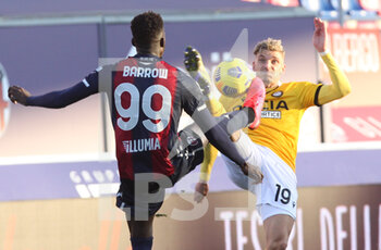 2021-01-06 - Bologna's Musa Barrow (L) and Udinese's Jens Strygler Larsen during the Italian Serie A soccer match Bologna Fc Udinese at the Renato Dall'Ara stadium in Bologna, Italy, 6 January 2021. Ph. Michele Nucci - BOLOGNA VS UDINESE - ITALIAN SERIE A - SOCCER