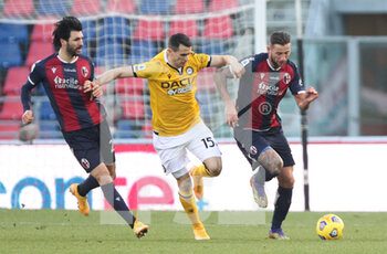 2021-01-06 - Udinese's Kevin Lasagna with Bologna's Roberto Soriano (L) and Bologna's Mitchell Dijks during the Italian Serie A soccer match Bologna Fc Udinese at the Renato Dall'Ara stadium in Bologna, Italy, 6 January 2021. Ph. Michele Nucci - BOLOGNA VS UDINESE - ITALIAN SERIE A - SOCCER