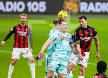 2021-01-09 - Alessio Romagnoli of AC Milan fights for the ball against Andrea Belotti of Torino FC - AC MILAN VS TORINO FC - ITALIAN SERIE A - SOCCER