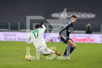 2021-01-10 - 8 Aaron Ramsey (Juventus FC) vs Mert Muldur (Sassuolo) - JUVENTUS FC VS US SASSUOLO - ITALIAN SERIE A - SOCCER