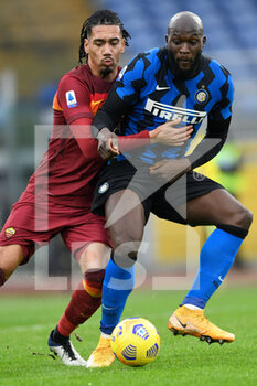 2021-01-10 - ROME, ITALY - January 10 : Chris Smalling (L) of AS Roma in action against Romelu Lukaku (R) of FC International Milan  during the Serie A soccer match between AS Roma and FC International Milan at Stadio Olimpico on January 10,2021 in Rome Italy - AS ROMA VS FC INTERNAZIONALE - ITALIAN SERIE A - SOCCER