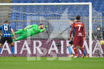 2021-01-10 - ROME, ITALY - January 10 : Milan Skriniar of FC International Milan scoring a goal during the Italian Serie A soccer match between AS Roma and FC International Milan at Stadio Olimpico on January 10,2021 in Rome Italy - AS ROMA VS FC INTERNAZIONALE - ITALIAN SERIE A - SOCCER