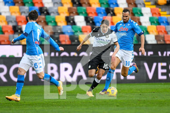 2021-01-10 - Nahuel Molina (Udinese) in action hindered by Nikola Maksimovic (Napoli) - UDINESE CALCIO VS SSC NAPOLI - ITALIAN SERIE A - SOCCER