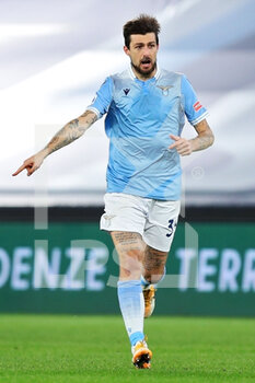 2021-01-15 - Francesco Acerbi of Lazio in action during the Italian championship Serie A football match between SS Lazio and AS Roma on January 15, 2021 at Stadio Olimpico in Rome, Italy - Photo Federico Proietti / DPPI - SS LAZIO VS AS ROMA - ITALIAN SERIE A - SOCCER