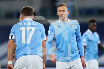 2021-01-15 - Lucas Leiva of Lazio (R) reacts during the Italian championship Serie A football match between SS Lazio and AS Roma on January 15, 2021 at Stadio Olimpico in Rome, Italy - Photo Federico Proietti / DPPI - SS LAZIO VS AS ROMA - ITALIAN SERIE A - SOCCER