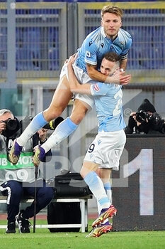 2021-01-15 - Ciro Immobile of Lazio (UP) celebrates with Manuel Lazzari after scoring 1-0 goal during the Italian championship Serie A football match between SS Lazio and AS Roma on January 15, 2021 at Stadio Olimpico in Rome, Italy - Photo Federico Proietti / DPPI - SS LAZIO VS AS ROMA - ITALIAN SERIE A - SOCCER