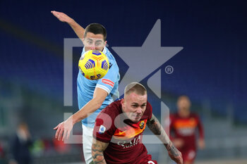 2021-01-15 - Adam Marusic of Lazio (UP) goes for a header with Rick Karsdorp of Roma during the Italian championship Serie A football match between SS Lazio and AS Roma on January 15, 2021 at Stadio Olimpico in Rome, Italy - Photo Federico Proietti / DPPI - SS LAZIO VS AS ROMA - ITALIAN SERIE A - SOCCER
