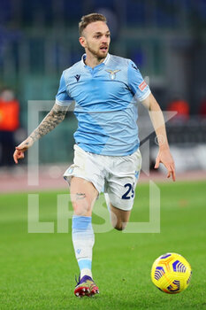 2021-01-15 - Manuel Lazzari of Lazio in action during the Italian championship Serie A football match between SS Lazio and AS Roma on January 15, 2021 at Stadio Olimpico in Rome, Italy - Photo Federico Proietti / DPPI - SS LAZIO VS AS ROMA - ITALIAN SERIE A - SOCCER