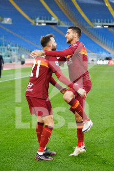 2021-01-23 -  ROME, ITALY - January 23 : Lorenzo Pellegrini (7 ) of AS Roma celebrates with his Borja Maioralafter scoring a goal during Italian Serie A soccer match between AS Roma and Spezia n at Stadio Olimpico on January 23,2021 in Rome Italy - AS ROMA VS SPEZIA CALCIO - ITALIAN SERIE A - SOCCER