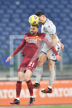 2021-01-31 - ROME, ITALY - January 31 : Borja Mayoral (L) of AS Roma in action against Koray Gunter  (R) of Hellas Verona  during the Serie A soccer match between AS Roma and Hellas Verona at Stadio Olimpico on January 31,2021 in Rome Italy - AS ROMA VS HELLAS VERONA - ITALIAN SERIE A - SOCCER