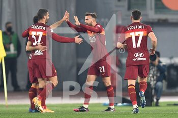 2021-01-31 -  ROME, ITALY - January 31 : Borja Mayoral (21 ) of AS Roma celebrates with his team mates after scoring a goal during Italian Serie A soccer match between AS Roma and Hellas Verona n at Stadio Olimpico on January 31,2021 in Rome Italy - AS ROMA VS HELLAS VERONA - ITALIAN SERIE A - SOCCER