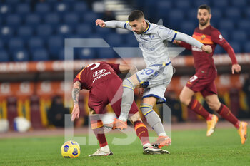 2021-01-31 - ROME, ITALY - January 31 : Mattia Zaccagni (L) of Hellas Verona in action  during the Serie A soccer match between AS Roma and Hellas Verona at Stadio Olimpico on January 31,2021 in Rome Italy - AS ROMA VS HELLAS VERONA - ITALIAN SERIE A - SOCCER