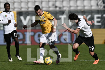 2021-01-31 - Tolgay Arslan of Udinese Calcio in action against Luca Vignali of Spezia 1906 - SPEZIA CALCIO VS UDINESE CALCIO - ITALIAN SERIE A - SOCCER