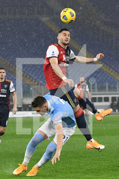2021-02-07 - Charalampos Lykogiannis (R) of Cagliari in action against Serjei Milinkovic (L) of Lazio - SS LAZIO VS CAGLIARI CALCIO - ITALIAN SERIE A - SOCCER