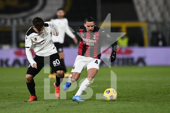 2021-02-13 - Ismael Bennacer of AC Milan in action against Kevin Agudelo of AC Spezia  - SPEZIA CALCIO VS AC MILAN - ITALIAN SERIE A - SOCCER