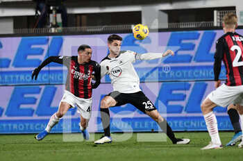 2021-02-13 - Giulio Maggiore of AC Spezia in action against Ismael Bennacer of AC Milan - SPEZIA CALCIO VS AC MILAN - ITALIAN SERIE A - SOCCER