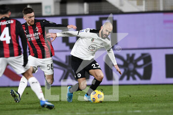 2021-02-13 - Riccardo Saponara of AC Spezia in action against Theo Hernandez of AC Milan - SPEZIA CALCIO VS AC MILAN - ITALIAN SERIE A - SOCCER