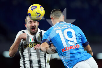 2021-02-13 - Giorgio Chiellini of Juventus (L) goes for a header with Nikola Maksimovic of Napoli (R) during the Italian championship Serie A football match between SSC Napoli and Juventus FC on February 13, 2021 at Diego Armando Maradona Stadium in Naples, Italy - Photo Federico Proietti / DPPI - SSC NAPOLI AND JUVENTUS FC - ITALIAN SERIE A - SOCCER