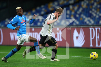 2021-02-13 - Victor Osimhen of Napoli (L) vies for the ball with Matthijs De Ligt of Juventus (R) during the Italian championship Serie A football match between SSC Napoli and Juventus FC on February 13, 2021 at Diego Armando Maradona Stadium in Naples, Italy - Photo Federico Proietti / DPPI - SSC NAPOLI AND JUVENTUS FC - ITALIAN SERIE A - SOCCER