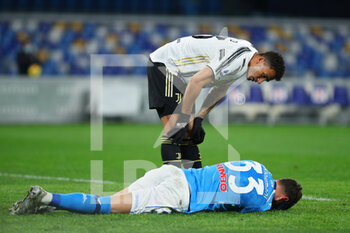 2021-02-13 - Amir Rrahmani of Napoli reacts after being injured during the Italian championship Serie A football match between SSC Napoli and Juventus FC on February 13, 2021 at Diego Armando Maradona Stadium in Naples, Italy - Photo Federico Proietti / DPPI - SSC NAPOLI AND JUVENTUS FC - ITALIAN SERIE A - SOCCER