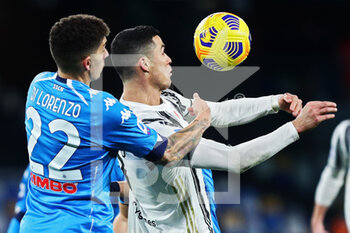 2021-02-13 - Cristiano Ronaldo of Juventus (R) in action withGiovanni Di Lorenzo of Napoli (L) during the Italian championship Serie A football match between SSC Napoli and Juventus FC on February 13, 2021 at Diego Armando Maradona Stadium in Naples, Italy - Photo Federico Proietti / DPPI - SSC NAPOLI AND JUVENTUS FC - ITALIAN SERIE A - SOCCER