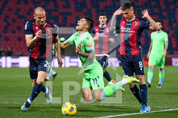 2021-02-27 - Foul of Nicolas Domínguez (Bologna) on Carlos Joaquin Correa (Lazio) - BOLOGNA FC VS SS LAZIO - ITALIAN SERIE A - SOCCER