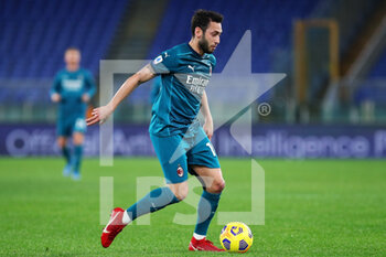 2021-02-28 - Hakan Calhanoglu of Milan in action during the Italian championship Serie A football match between AS Roma and AC Milan on February 28, 2021 at Stadio Olimpico in Rome, Italy - Photo Federico Proietti / DPPI - AS ROMA AND AC MILAN - ITALIAN SERIE A - SOCCER