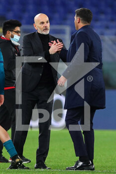 2021-02-28 - Stefano Pioli head coach of Milan (L) and Paulo Fonseca head coach of Roma (R) greet each other at the end of the Italian championship Serie A football match between AS Roma and AC Milan on February 28, 2021 at Stadio Olimpico in Rome, Italy - Photo Federico Proietti / DPPI - AS ROMA AND AC MILAN - ITALIAN SERIE A - SOCCER