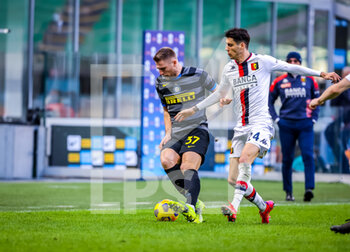 2021-02-28 - Milan Skriniar of FC Internazionale fights for the ball against Filippo Melegoni of Genoa CFC - FC INTERNAZIONALE VS GENOA CFC - ITALIAN SERIE A - SOCCER