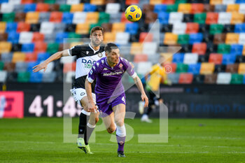 2021-02-28 - Nikola Milenkovic (Fiorentina) in action against Fernando Llorente (Udinese) - UDINESE CALCIO VS ACF FIORENTINA - ITALIAN SERIE A - SOCCER