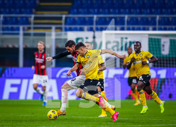2021-03-03 - Theo Hernandez of AC Milan fights for the ball against Nahuel Molina of Udinese Calcio - AC MILAN VS UDINESE CALCIO - ITALIAN SERIE A - SOCCER