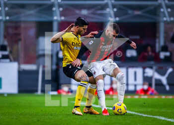 2021-03-03 - Ante Rebic of AC Milanfights for the ball against Kevin Bonifazi of Udinese Calcio - AC MILAN VS UDINESE CALCIO - ITALIAN SERIE A - SOCCER