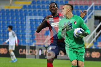 2021-03-20 - Simy (Crotone FC) and Lukasz Skorupski (Bologna FC) during the Serie A soccer match between Crotone FC - Bologna FC, Stadio Ezio Scida on March 20, 2021 in Crotone Italy - FC CROTONE VS BOLOGNA FC - ITALIAN SERIE A - SOCCER