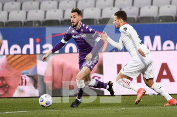 2021-03-21 - Gaetano Castrovilli (ACF Fiorentina) and Diogo Dalot (AC Milan) - ACF FIORENTINA VS AC MILAN - ITALIAN SERIE A - SOCCER
