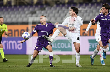 2021-03-21 - Franck Ribery of ACF Fiorentina in action against Sandro Tonali of AC Milan  - ACF FIORENTINA VS AC MILAN - ITALIAN SERIE A - SOCCER