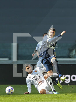 2021-03-21 - Federico Barba (Benevento) fights for the ball against Alvaro Morata (Juventus FC) - JUVENTUS FC VS BENEVENTO CALCIO - ITALIAN SERIE A - SOCCER