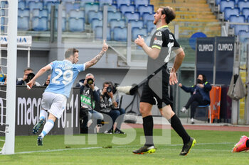 2021-04-03 - Manuel Lazzari of SS Lazio celebrates after scoring goal 1-0 seen in action during the Italian Football Championship League A 2020/2021 match between SS Lazio vs Spezia Calcio at the Olimpic Stadium in Rome. - SS LAZIO VS SPEZIA CALCIO - ITALIAN SERIE A - SOCCER
