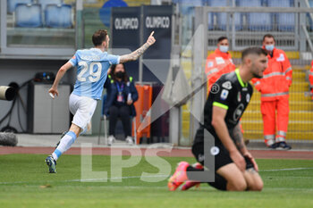 2021-04-03 - Manuel Lazzari of SS Lazio celebrates after scoring goal 1-0 seen in action during the Italian Football Championship League A 2020/2021 match between SS Lazio vs Spezia Calcio at the Olimpic Stadium in Rome. - SS LAZIO VS SPEZIA CALCIO - ITALIAN SERIE A - SOCCER