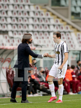2021-04-03 - Federico Chiesa (Juventus FC) celebrates with Andrea Pirlo (Coach Juventus FC) - TORINO FC VS JUVENTUS FC - ITALIAN SERIE A - SOCCER