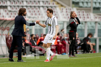 2021-04-03 - Federico Chiesa (Juventus FC) celebrates the goal with Andrea Pirlo (Coach Juventus FC) - TORINO FC VS JUVENTUS FC - ITALIAN SERIE A - SOCCER