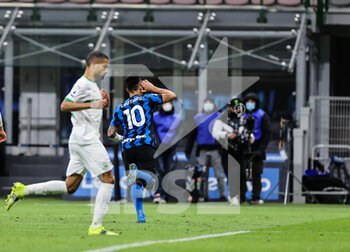 2021-04-07 - Lautaro Martínez of FC Internazionale celebrates after scoring a goal during the Serie A 2020/21 football match between FC Internazionale vs US Sassuolo at the San Siro Stadium, Milan, Italy on April 07, 2021 - Photo FCI / Fabrizio Carabelli - INTER - FC INTERNAZIONALE VS US SASSUOLO - ITALIAN SERIE A - SOCCER